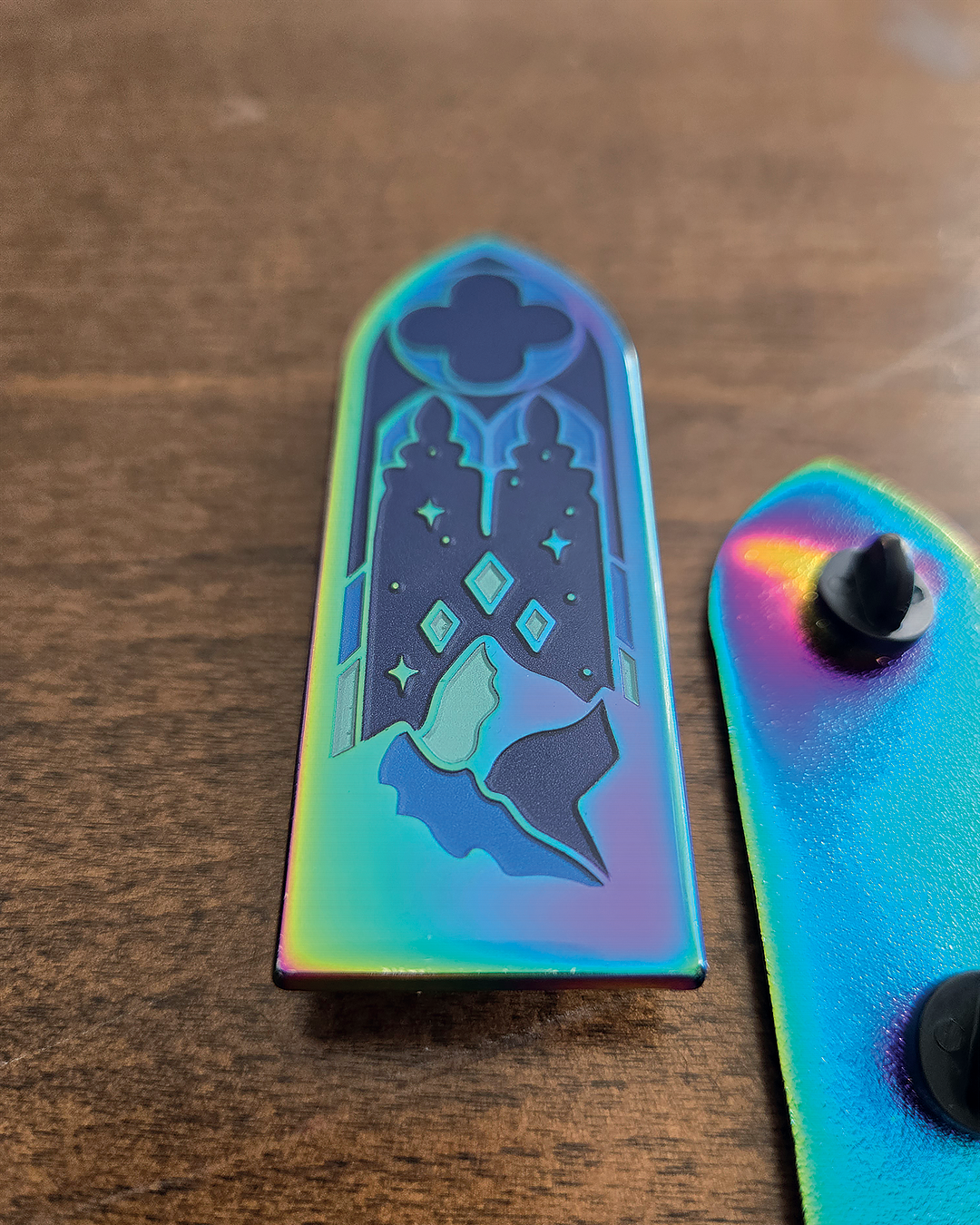 A Court of Thorns And Roses Stained Glass Enamel Pin.